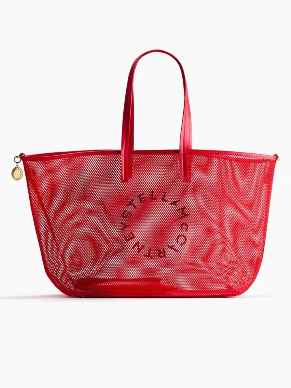 Stella McCartney Large Red Mesh Tote Bag x H&M in hands